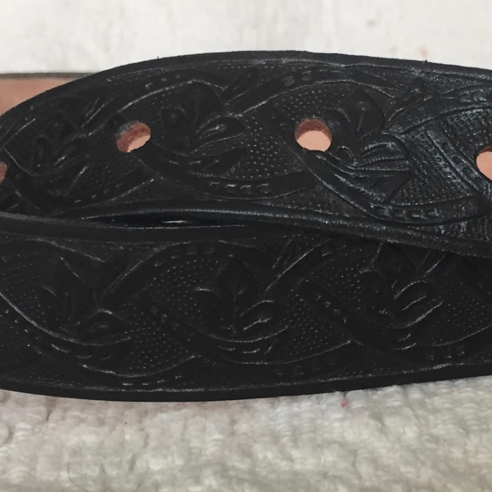Tooled black leather belt